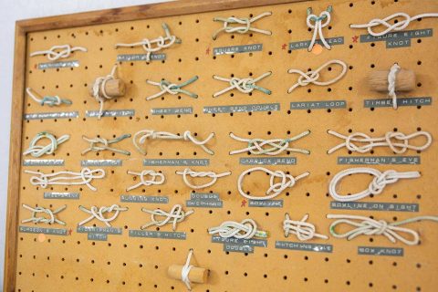Peg board displaying a variety of labeled knot types