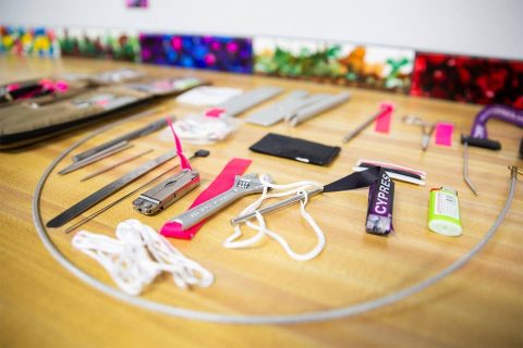 Table displaying a variety of tools used by parachute riggers